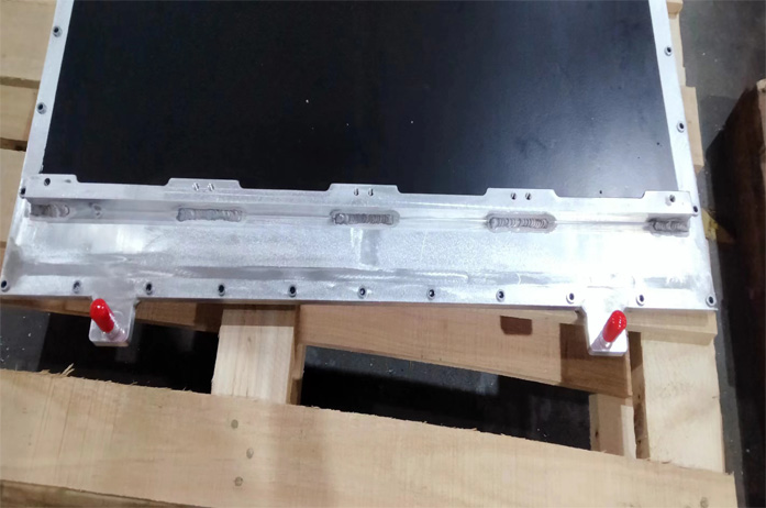 Plaque de refroidissement liquide à surface traitée